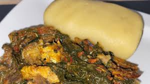 Vegetable soup, swallow with Catfish 